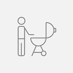 Image showing Man at barbecue grill line icon.