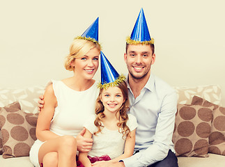 Image showing happy family in hats celebrating