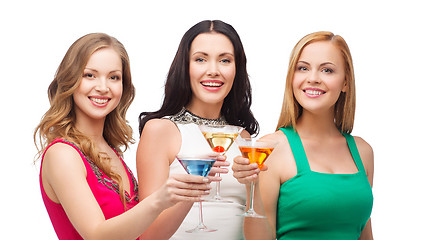 Image showing three smiling women with cocktails