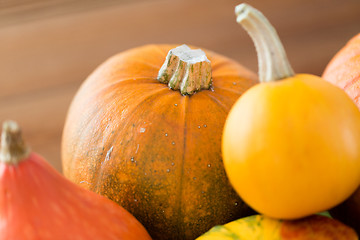 Image showing close up of pumpkins on wooden table at home