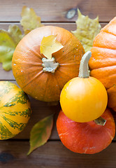 Image showing close up of pumpkins on wooden table at home