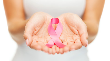 Image showing hands holding pink breast cancer awareness ribbon