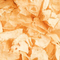 Image showing Retro looking Potato chips crisps