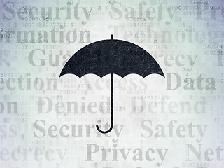 Image showing Protection concept: Umbrella on Digital Paper background