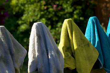 Image showing colorful rags drying outside