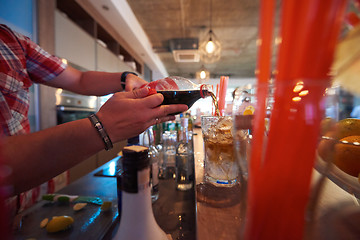 Image showing barman prepare fresh coctail drink