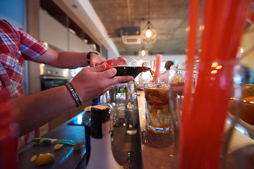 Image showing barman prepare fresh coctail drink