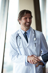 Image showing doctor handshake with a patient