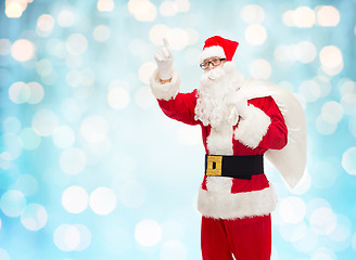 Image showing man in costume of santa claus with bag