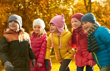 Image showing group of happy children having fun in autumn park