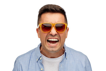 Image showing face of angry man in shirt and sunglasses