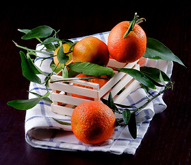 Image showing Ripe Tangerines with Leafs