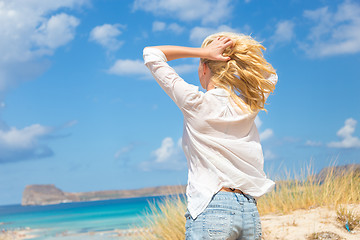 Image showing Free Happy Woman Enjoying Sun on Vacations.