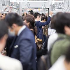 Image showing Passengers traveling by Tokyo metro.