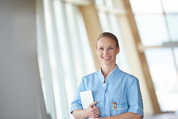 Image showing female doctor with tablet computer