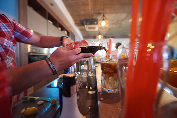 Image showing barman prepare fresh coctail drink