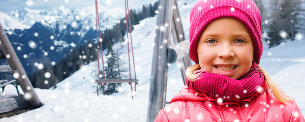 Image showing happy beautiful little girl over winter background