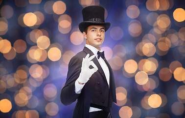 Image showing magician in top hat showing ok hand sign