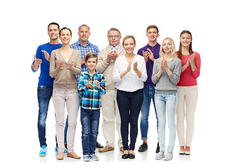 Image showing group of smiling people applauding