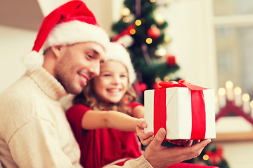 Image showing close up of father and daughter with gift box