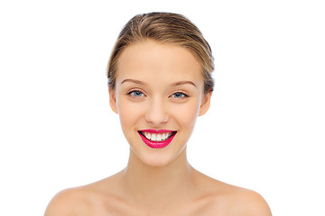 Image showing smiling young woman face and shoulders