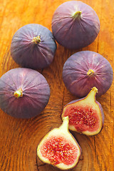 Image showing The fig on the wooden board, fresh fig