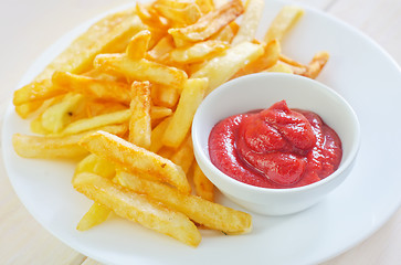 Image showing potato fries with sauce