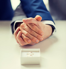 Image showing close up of male gay couple and wedding rings