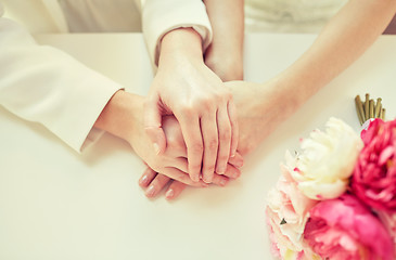 Image showing close up of happy married lesbian couple hands