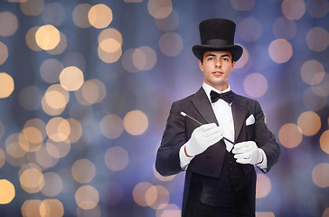 Image showing magician in top hat with magic wand