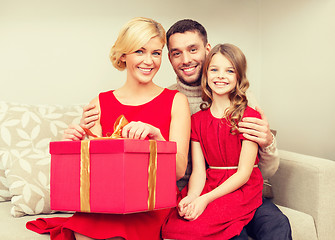 Image showing happy family opening gift box