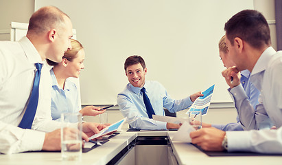 Image showing group of smiling businesspeople meeting in office