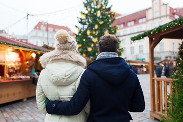 Image showing close up of couple in old town at christmas