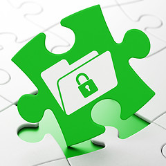 Image showing Business concept: Folder With Lock on puzzle background