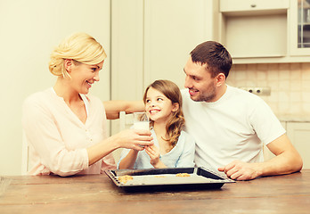 Image showing happy family making cookies at home