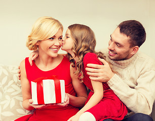 Image showing adorable child kisses her mother