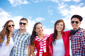 Image showing group of smiling teenagers hanging out