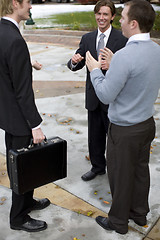 Image showing businessmen talking