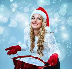 Image showing Beautiful young woman in Santa Claus clothes