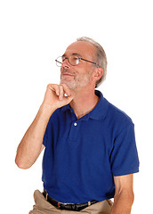 Image showing Thinking man with hand on chin.