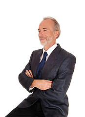 Image showing Happy businessman with arms grossed.