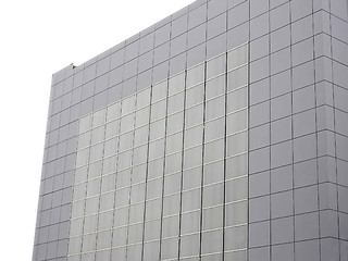 Image showing Outer wall of modern building over white