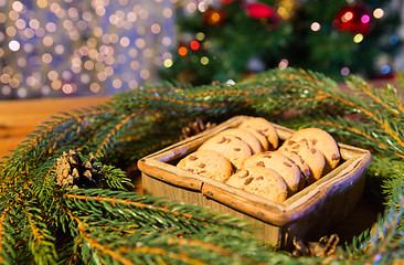 Image showing natural green fir christmas wreath and oat cookies