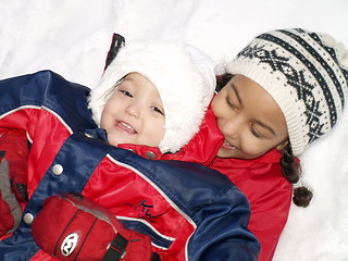 Image showing sisters in the snow