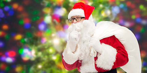 Image showing man in costume of santa claus with bag