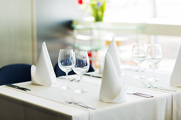 Image showing close up of table setting with glasses and cutlery