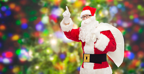 Image showing man in costume of santa claus with bag