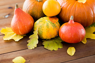 Image showing close up of pumpkins on wooden table at home