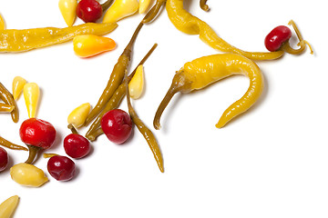 Image showing Mix of hot marinated peppers isolated on white background