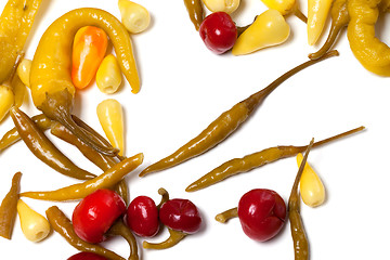 Image showing Mix of hot marinated peppers on white background